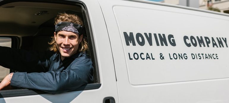 man driving a moving van